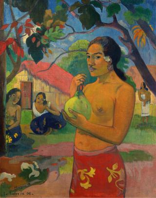 Woman Holding a Fruit